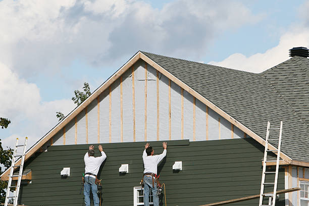Professional Siding Replacement technician working in Perkasie, PA